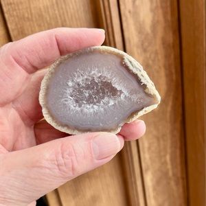 Geode with sparkly tiny crystals in center.